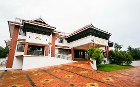 Capital O 47329 Pooram Residency Deluxe
